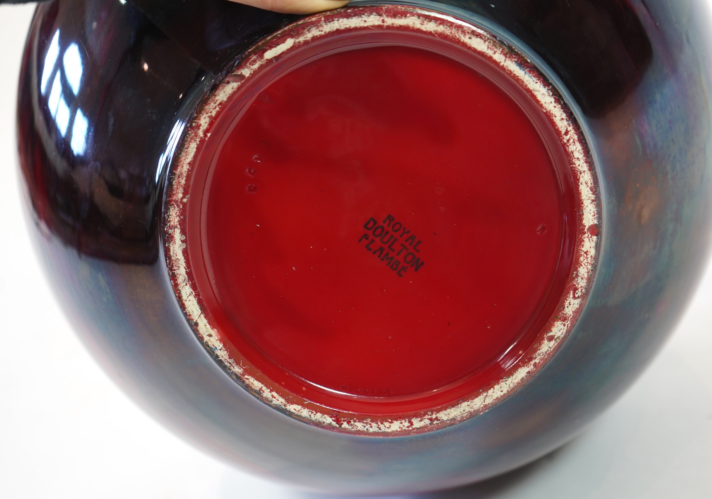 A large Doulton flambe vase decorated with ships, 29cm high